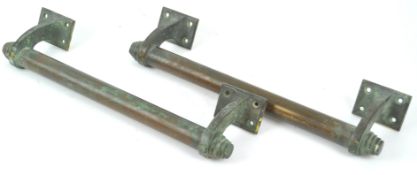 A pair of early 20th century Art Deco vintage architectural bronze pull handles,