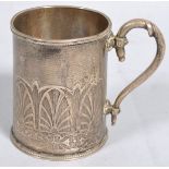 A silver mug of plain cylindrical tapering form,