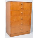 A 1960's retro vintage teak wood chest of drawers, having a graduating run of six drawers,