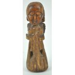An unusual Chinese carved hardwood figure of a lady, possibly a finial port, probably 18th century,
