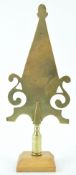 A 19th century West Country Friendly brass stave head, High Littleton, on a later mahogany plinth,