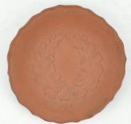 A small Redware dish with moulded decoration (an old Collector's label states Elers, (1690-1700), 8.