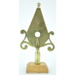 A 19th century West Country Friendly brass stave head, Weston Zoyland, on later mahogany plinth,