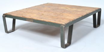 An Industrial iron mounted palette table, marked MGK Engineering, Birmingham, WO64 6858,