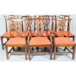 A Harlequin set of six Chippendale style mahogany dining chairs and a elbow corner chair.