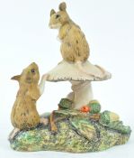 A Royal Doulton figure from the Wildlife collection of two mice on a mushroom, printed marks,