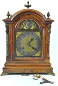 A walnut and gilt metal mounted bracket clock, the eight day movement striking on a gong,