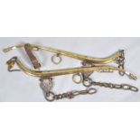 A pair of solid brass 'No 2 patent double cased' harness with solid leather straps and chains,