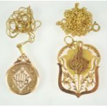 A selection of two gold pendants of abstract design, each suspended from chains.
