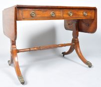 A 19th century mahogany cross banded sofa table with drop ends,