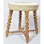 A Victorian stool with tapestry seat on later gold painted barley twist legs,