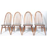 A set of four Ercol stained beech and elm dining chairs,