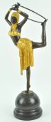 After Chiparus, a bronze figure of a dancer with a hoop,