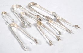 A pair of silver bead edge sugar tongs, with anthemions bowls, Glasgow 1873, 15cm long,