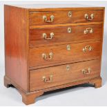 A mahogany chest of four graduated drawers on bracket feet with brass handles,