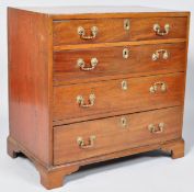 A mahogany chest of four graduated drawers on bracket feet with brass handles,