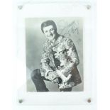A signed photograph of Liberace, dated 1972, and inscribed tio Roy, 22.