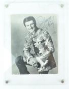A signed photograph of Liberace, dated 1972, and inscribed tio Roy, 22.
