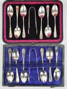 A cased set of six Old English pattern tea spoons and a pair of sugar tongs,