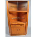 A G-plan corner cabinet, with two sliding glazed doors,