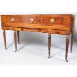 A George III square piano converted to a dressing table with two drawers above two short drawers,