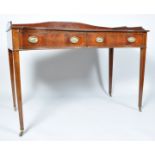 A 19th century mahogany sideboard with raised shaped back above two inverted frieze drawers on