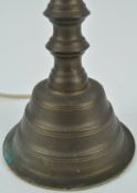 A brass lamp of angular baluster form, overall 61.