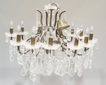 An antique style twelve branch cut glass chandelier with droplets,