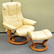 A Stressless leather chair and footstool,