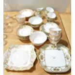 A Tuscan bone china part tea service and a Noritake gold and ivory ground part service