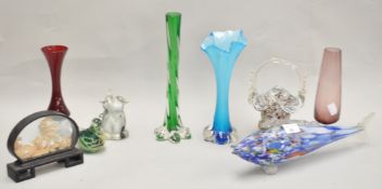 A glass fish and other items