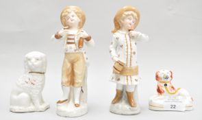 A pair of Continental Staffordshire figures,