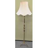 A brass standard lamp,