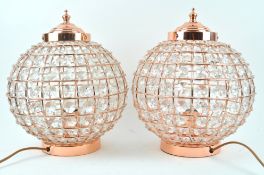 A pair of simulated copper and crystal globular ceiling lights,