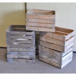 A collection of five vintage wooden wine/fruit crates