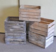 A collection of five vintage wooden wine/fruit crates