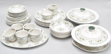 A Royal Doulton part dinner service, to include six cups and saucers, six bowls, six side plates,