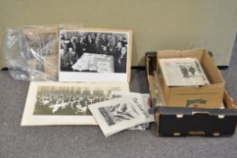 A box of newspaper and magazine articles, mostly early to mid 20th century,