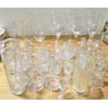 A collection of assorted drinking glasses and other items,