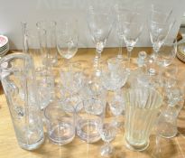 A collection of assorted drinking glasses and other items,