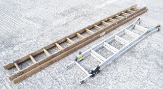 A wooden ladder and a metal step ladder