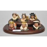 A Royal Doulton miniature character jug 'King & Queen;' set,