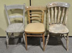 Three kitchen chairs, a stick back chair,