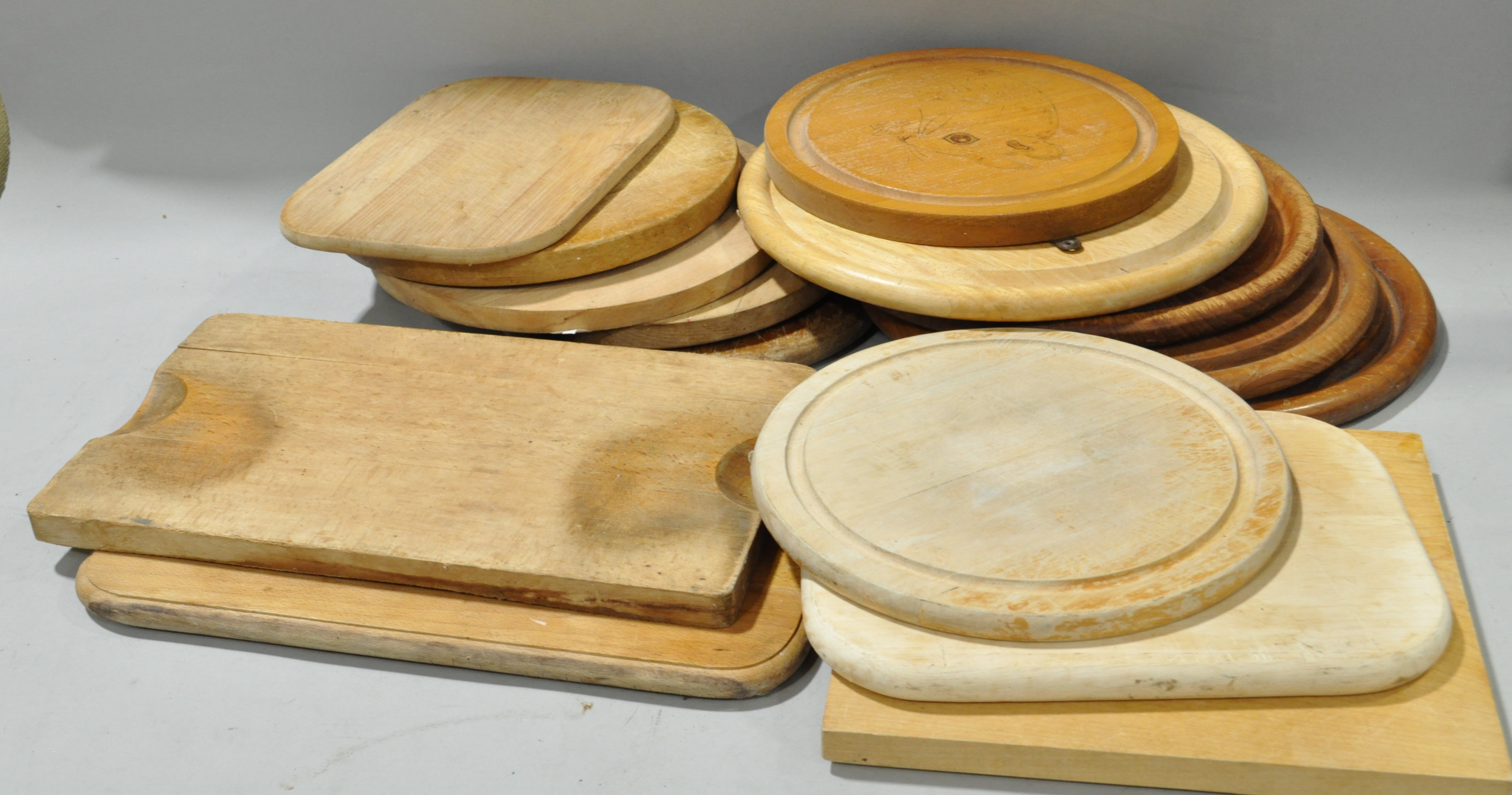 A quantity of wood bread boards
