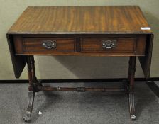 A mahogany small drop leaf sofa table with two drawers,