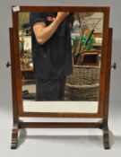 A mahogany dressing table swing mirror,