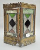 A Victorian lantern, in brass set with coloured and patterned leaded glass panels,