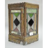 A Victorian lantern, in brass set with coloured and patterned leaded glass panels,