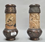 A pair of Bretby vases, decorated with rabbits dressed as Samurai,
