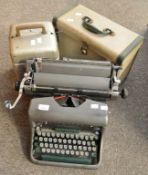 Two projectors and a typewriter